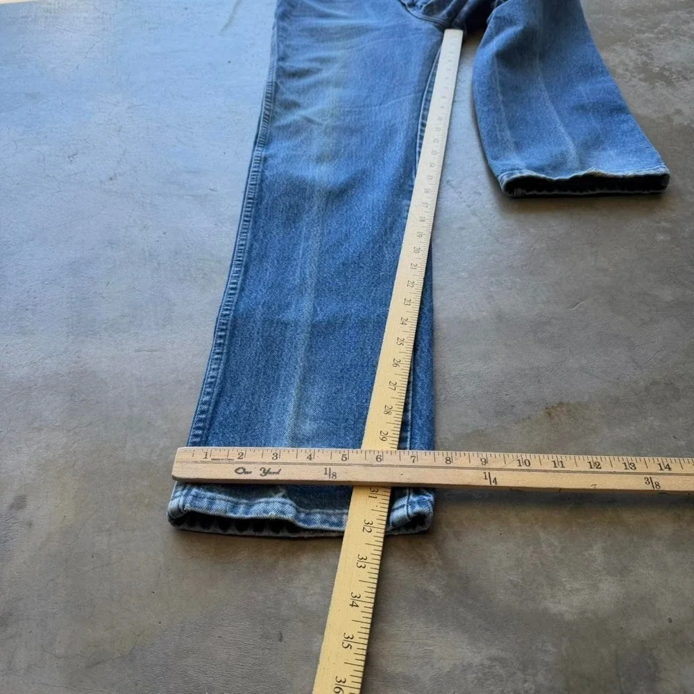Vintage 90's Wrangler made in USA cowboy cut faded denim straight jeans 28x32